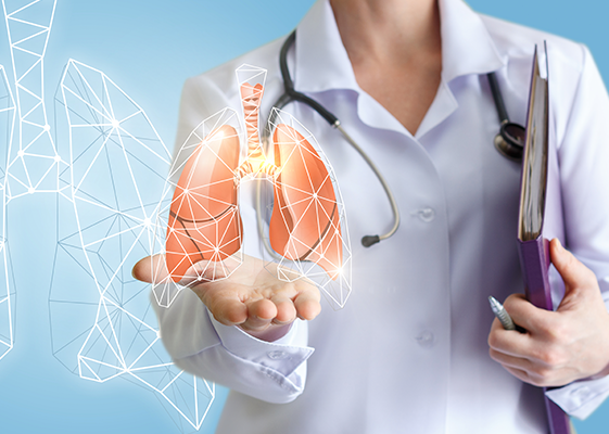 Medical professional holding a digital 3D hologram of human lungs, symbolizing advanced respiratory care and diagnostics.